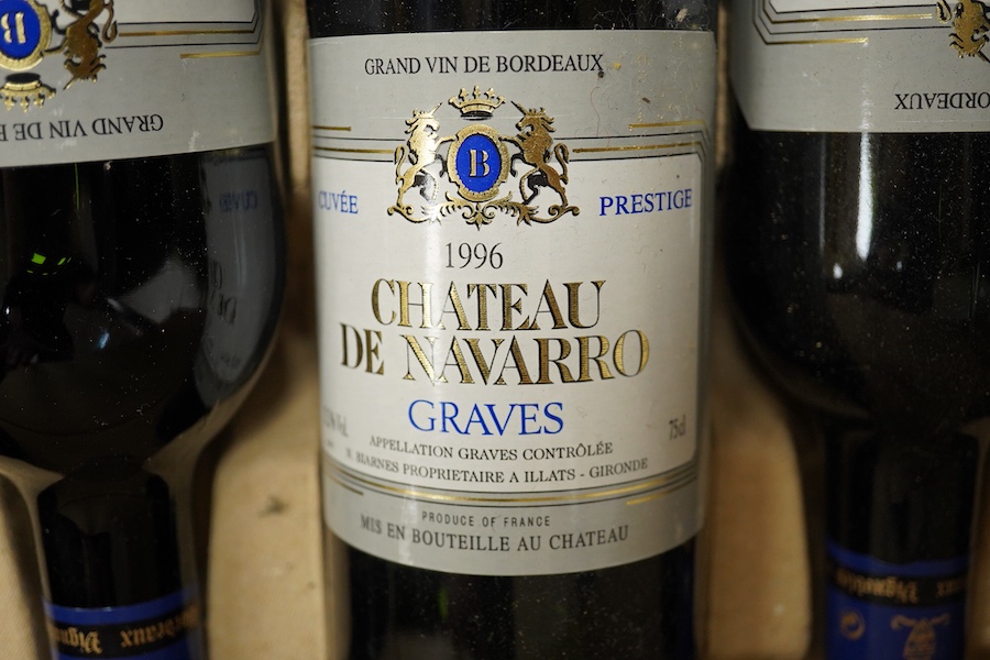 A box of twelve Chateau de Navarro Graves, six bottles 1996 and six bottles 1993, condition - unknown storage.
